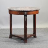 A French style circular occasional table, with a marble top,