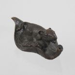 A Japanese bronze model of a rat on a leaf,