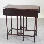 An Edwardian spider leg drop leaf occasional table,