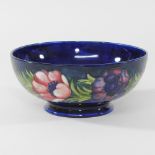 A Moorcroft pottery blue glazed dish,