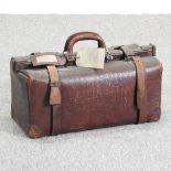 An early 20th century leather Gladstone bag,