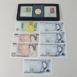 A collection of uncirculated bank notes,