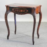 A continental burr walnut and marquetry side table, on cabriole legs,