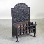 A black painted iron fire basket, with fire back,