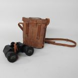 A pair of binoculars, cased,