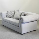 A modern grey upholstered chesterfield sofa, 180cm,