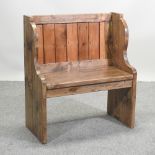 A bespoke made pine pew, of small proportions,