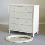 A white painted chest of drawers, containing two short over three long drawers, 100cm,