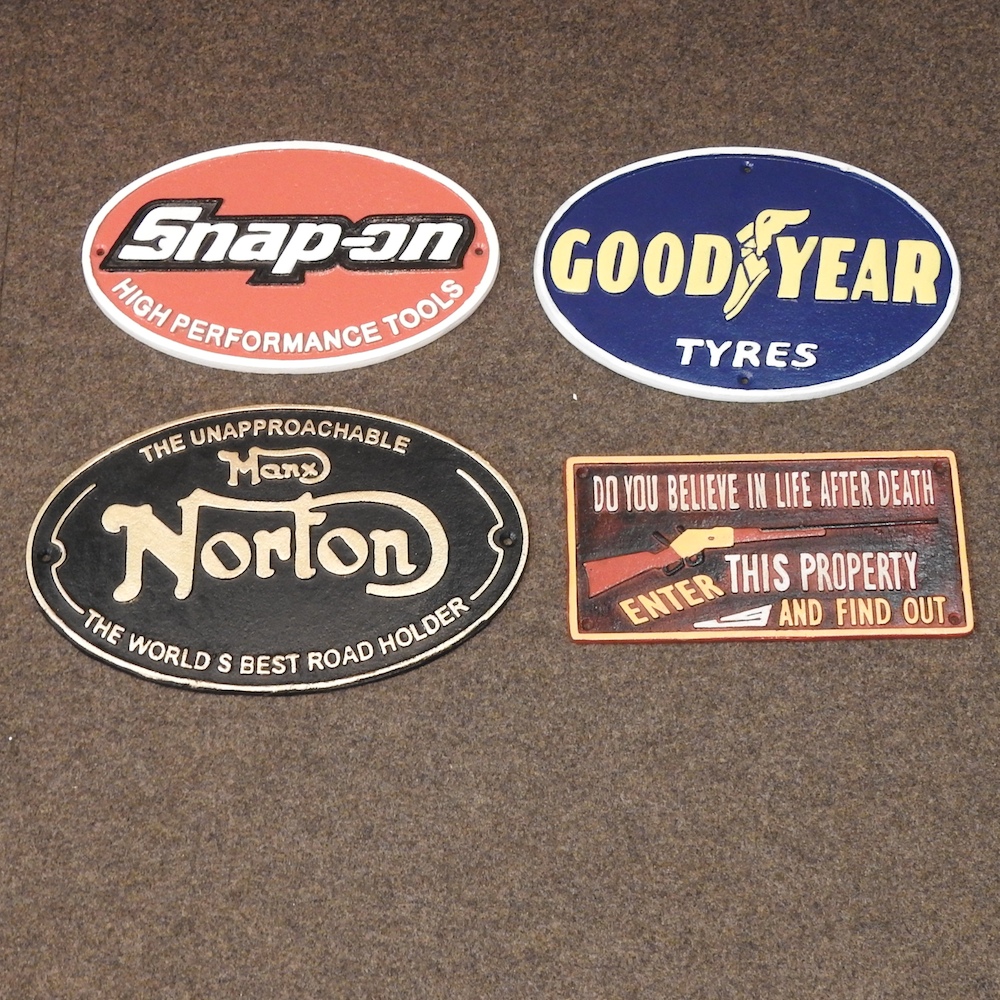 A reproduction metal Norton Manx sign, together with a Snap-On sign, a life and death sign,