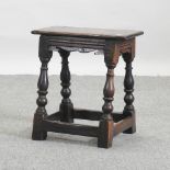 An 18th century style oak joint stool