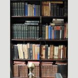 A collection of early 20th century and later books, some leather bound,