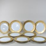 A set of fourteen Limoges dinner plates,