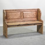 A bespoke made pine pew,