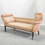 An Edwardian floral upholstered chaise longue,