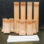 A collection of oak and white painted architectural mouldings,