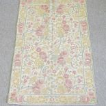 An Indian crewel work rug,