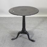 A 19th century carved oak pedestal occasional table,