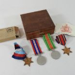 A World War II Burma Star medal, together with a 1939-1945 star,