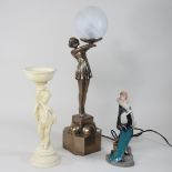 An Art Deco style figural table lamp, and shade, 54cm high overall,