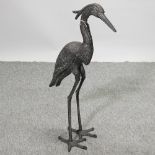 A metal model of a heron,