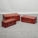 A set of three graduated reproduction painted metal Coca-Cola advertising trunks,