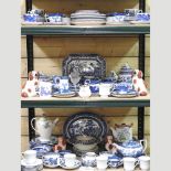 Three shelves of china,