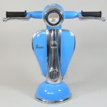 A lamp in the form of a blue scooter,