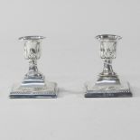 A pair of early 20th century silver candlesticks, Birmingham 1909,