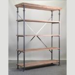 A modern wooden and metal baker's rack,