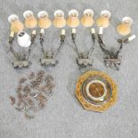 A collection of gilt metal wall lights and shades,