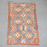 A kelim rug, with diamond pattern design,