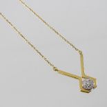 An 18 carat gold and diamond set pendant necklace,