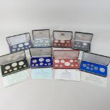 A collection of eight commonwealth proof coin sets
