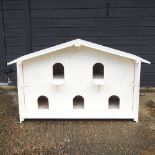 A white painted wooden dovecote,