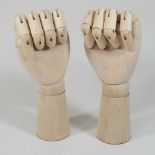 A pair of articulated artist's model hands,