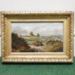 A W Darby, a heathland scene with a village beyond, signed and dated 1903, oil on board,