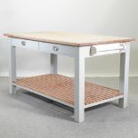 A pine and grey painted kitchen island, with a slatted base,