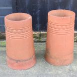 A pair of Bulmer terracotta chimney pots,