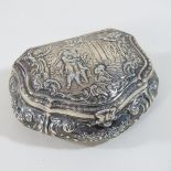 An early 20th century Dutch silver box snuff box, decorated in relief with figures and scrolls,