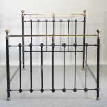 A modern black painted metal bed frame,
