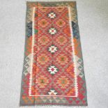 A kelim rug, with all over geometric design,