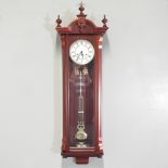 A regulator style wall clock,