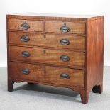 A regency mahogany chest of drawers, on bracket feet,