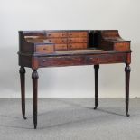 A reproduction Carlton House desk,