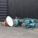 A petrol generator, together with a water pump,