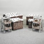 Two small painted wooden racks, together with a set of four wicker baskets, with pheasant liners,