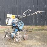 A Landmaster petrol garden rotovator