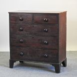 A 19th century mahogany chest of drawers, on bracket feet,