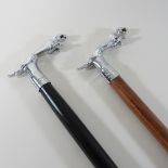 Two modern novelty walking sticks,