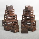 A set of six painted wooden crates, together with two sets of four wooden crates,